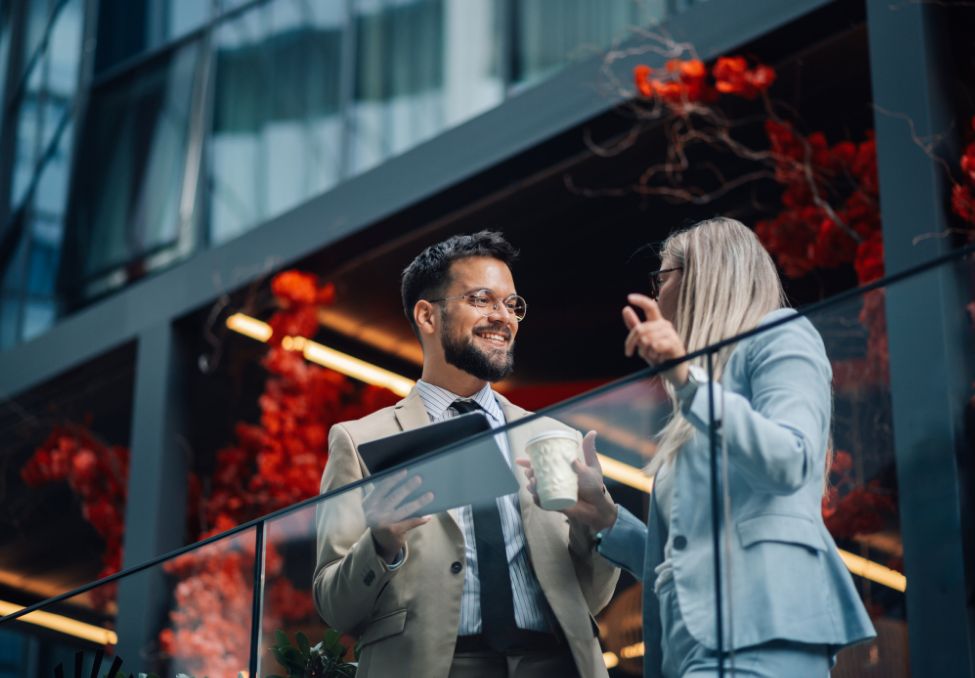 Smiling professionals discussing something